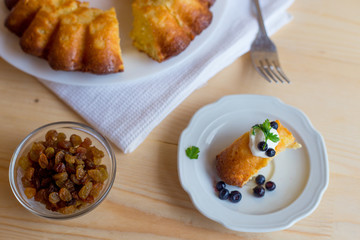 Cottage cheese baked pudding, sour cream and blueberries
