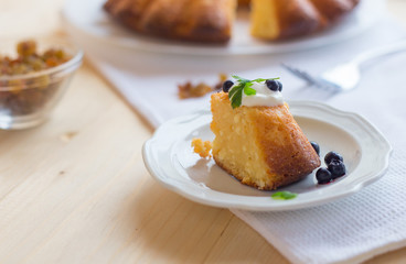 Cottage cheese baked pudding, sour cream and blueberries
