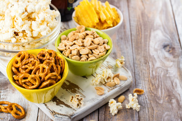 Beer snacks on wooden table