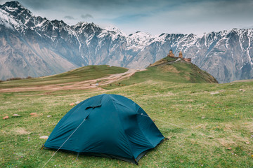 Kazbegi, Georgia. Tent Near Gergeti Trinity Church Or Tsminda Sameba