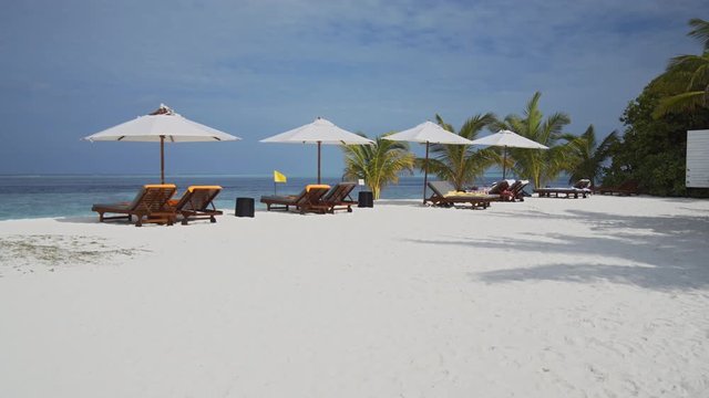 Sun Loungers and Beach Umbrellas on a Vaadhoo Island Beach