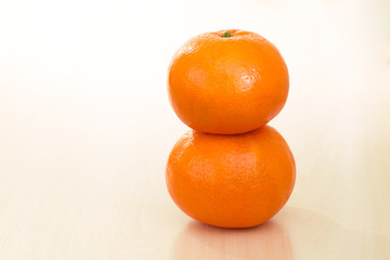 oranges on light wood background