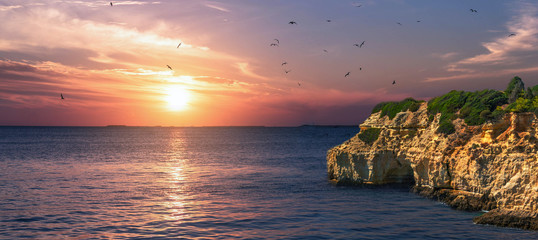 Fototapeta na wymiar rocky Algarve at Sunset, Portugal, romantik