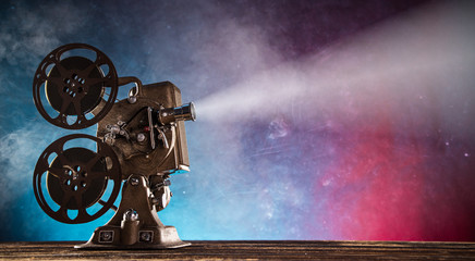 Old style movie projector, close-up. - obrazy, fototapety, plakaty