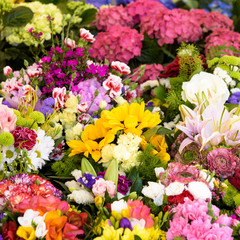  various spring flowers at a market