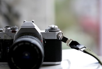 Fototapeta na wymiar Old photo camera; close up, selective focus.