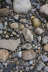 Multi colored rocks by river texture
