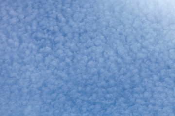 White clouds on a blue sky. Selective focus