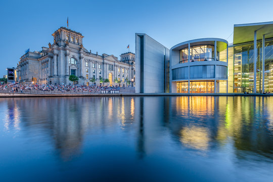 Berlin government district with Reichstag and Spree river in twilight, central Berlin Mitte, Germany