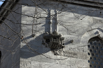 bird house on mosque wall