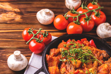 Traditional goulash soup close-up on  wooden table. Ingredients.