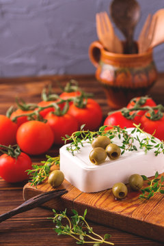 Feta with thyme, cherry tomatoes and green olives