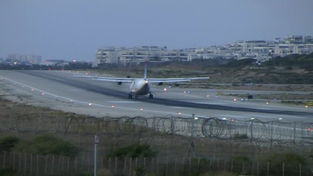 Plane landing at the Sde Dov airport in Tel-Aviv, Israel