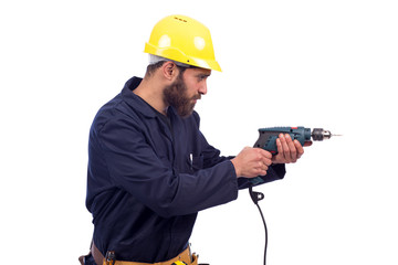 Young worker drilling