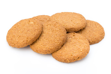 Stacked short pastry cookies isolated on white background.