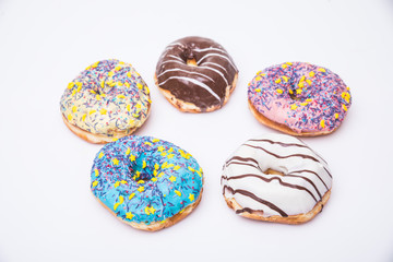 Set glazed cakes isolated on white background