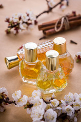 Bottles of perfume with ingredients