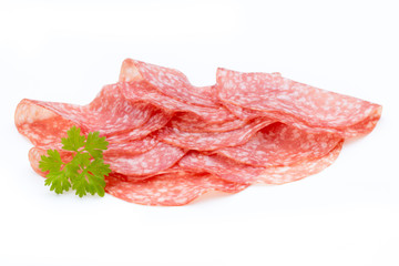 Salami smoked sausage slices isolated on white background cutout.