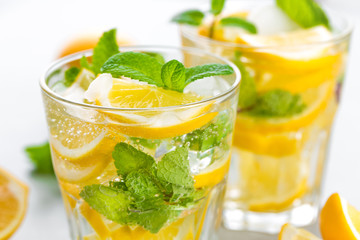 Lemon mojito cocktail with fresh mint, cold refreshing summer drink or beverage with ice