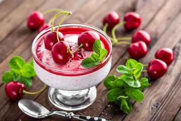 Fresh yogurt with cherry and chia seeds, delicious dessert for healthy breakfast