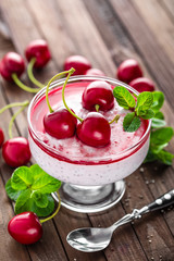 Fresh yogurt with cherry and chia seeds, delicious dessert for healthy breakfast