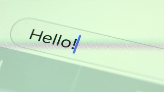 Typing a message on a smartphone device.