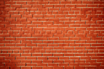 Deep red and brown texture of stained brick wall. Horizontal background