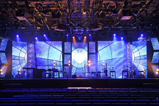 Concert Stage With Lights and Musical Instruments