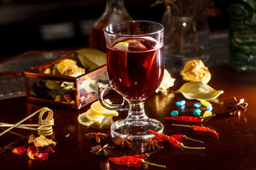 The traditional drink for winter evenings - mulled wine in the glass.