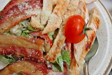      Serbian meat food with tomato in a dish 