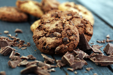 Chocolate cookies on wooden table. Chocolate chip cookies shot