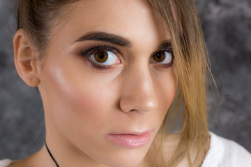 Fototapeta premium Beautiful girl portrait with professional makeup