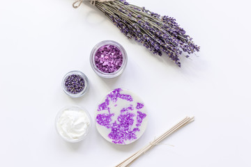 Obraz na płótnie Canvas lavender herbs in body care cosmetics top view space for text