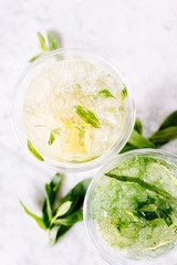 Mojito and lemonade. Flat lay, top view.