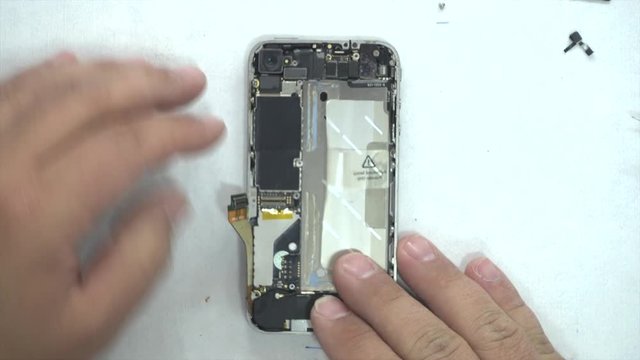 Technician Fixing iPhone in a lab.mp