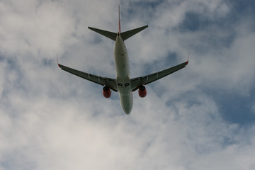 Below view Airplane in the sky and cloud