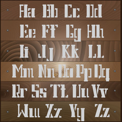  Vector illustration depicting the Latin alphabet in the form of a stencil on the boards 