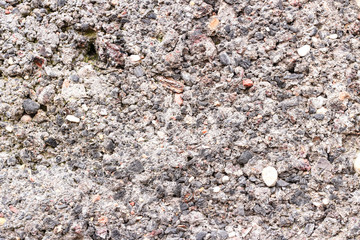 Texture of a wet stone as a grunge background