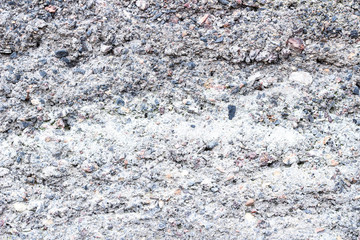 Texture of a wet stone as a grunge background