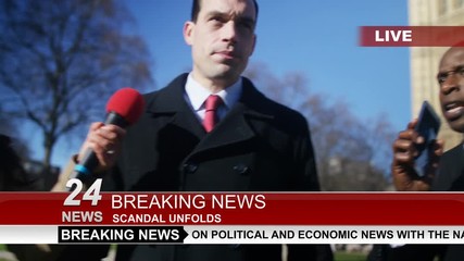  Man in business dress in London being bothered by news reporters
