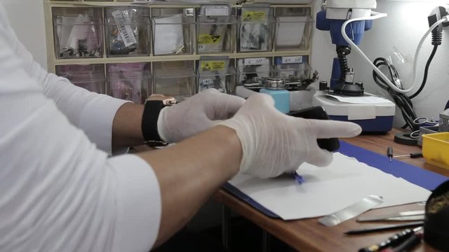 Mobile phone Technician at the lab