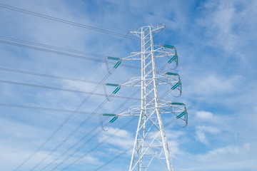 High voltage post, High voltage tower at blue sky background