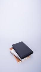 notebook or black leather notebook on the blackground.