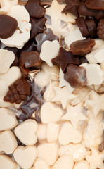 Assortment of colorful fruit chocolate in store