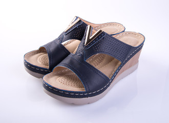 shoe or black color lady shoes on a background.