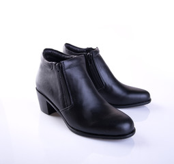 shoe or black color lady shoes on a background.