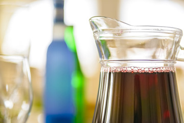Close up jug of red juice in restaurant