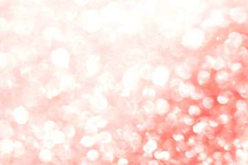 Red bokeh texture. Festive glitter background with defocused lights
