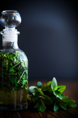 Mint syrup in a glass bottle