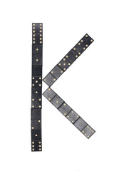 letter K made of  black  dominoes tiles